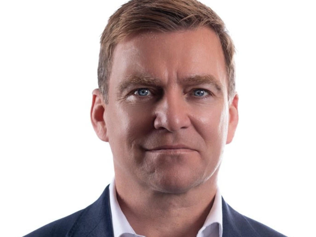 ComBank Executive Charged with Procuring Girls for Sex