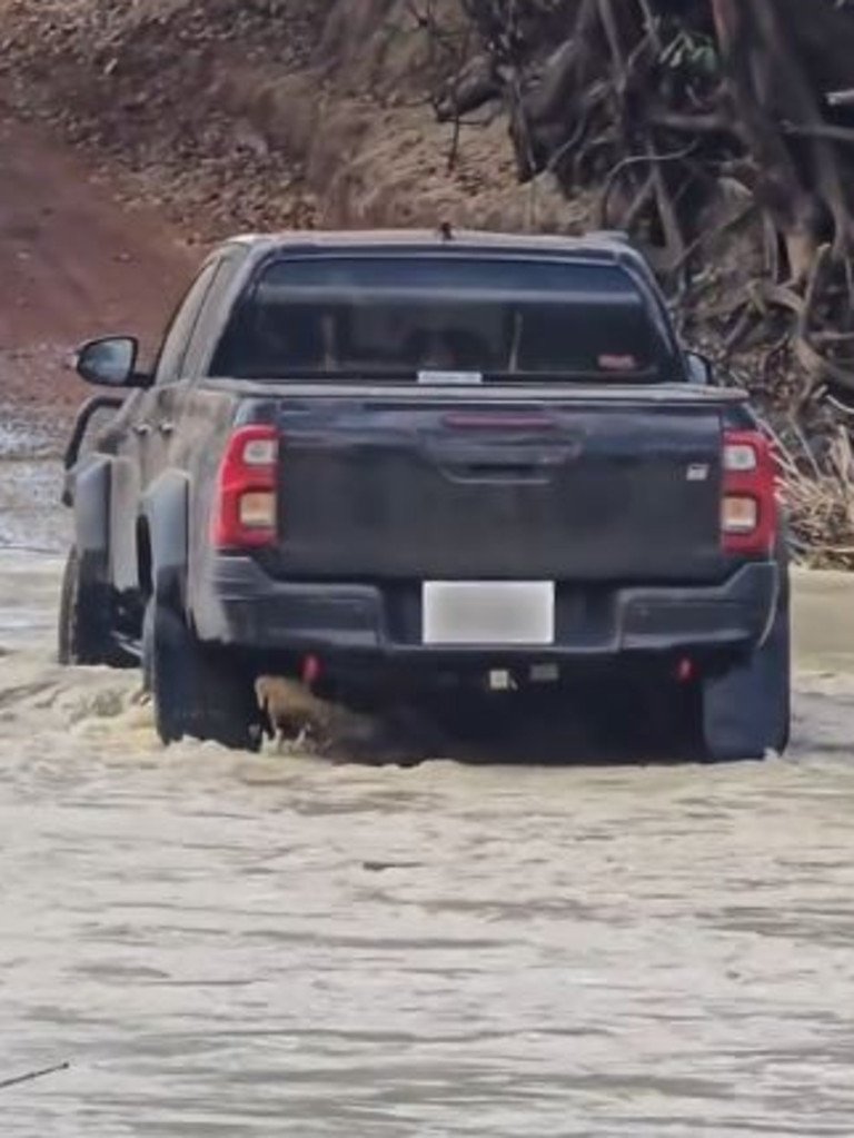 4WD Seen Driving Over Huge Crock In Australia second image