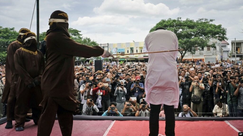 Indonesian Court Orders Public Caning Of Two Man After Hugging And Kissing In Public