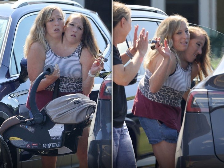 Conjoined Twins Break Silence After Photos Of Them Holding A Newborn