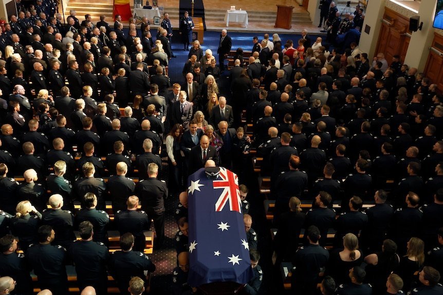 Grief Stricken Family Of Cop Killed By Desi Freeman Attend His Funeral
