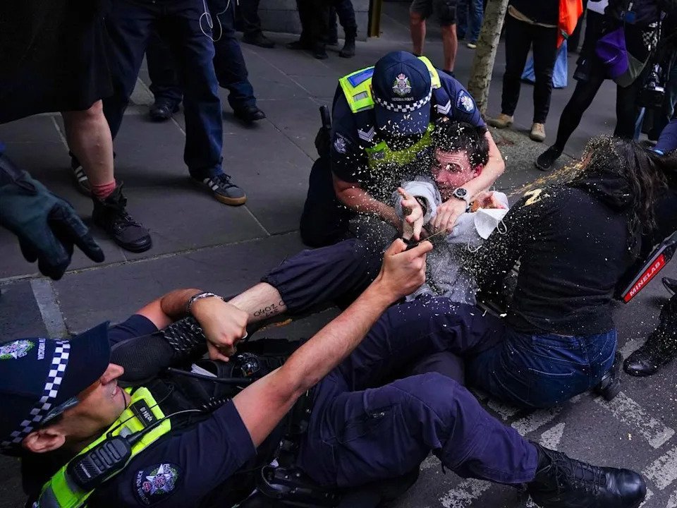 Riot Grips Melbourne CBD as Police Clash with Protesters