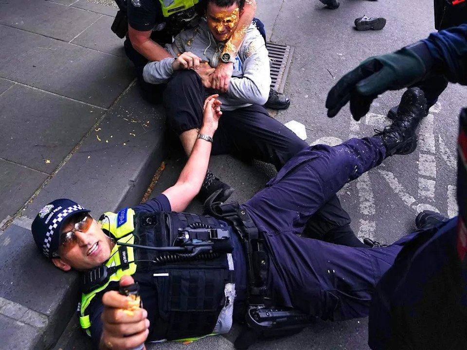 Riot Grips Melbourne CBD as Police Clash with Protesters second image