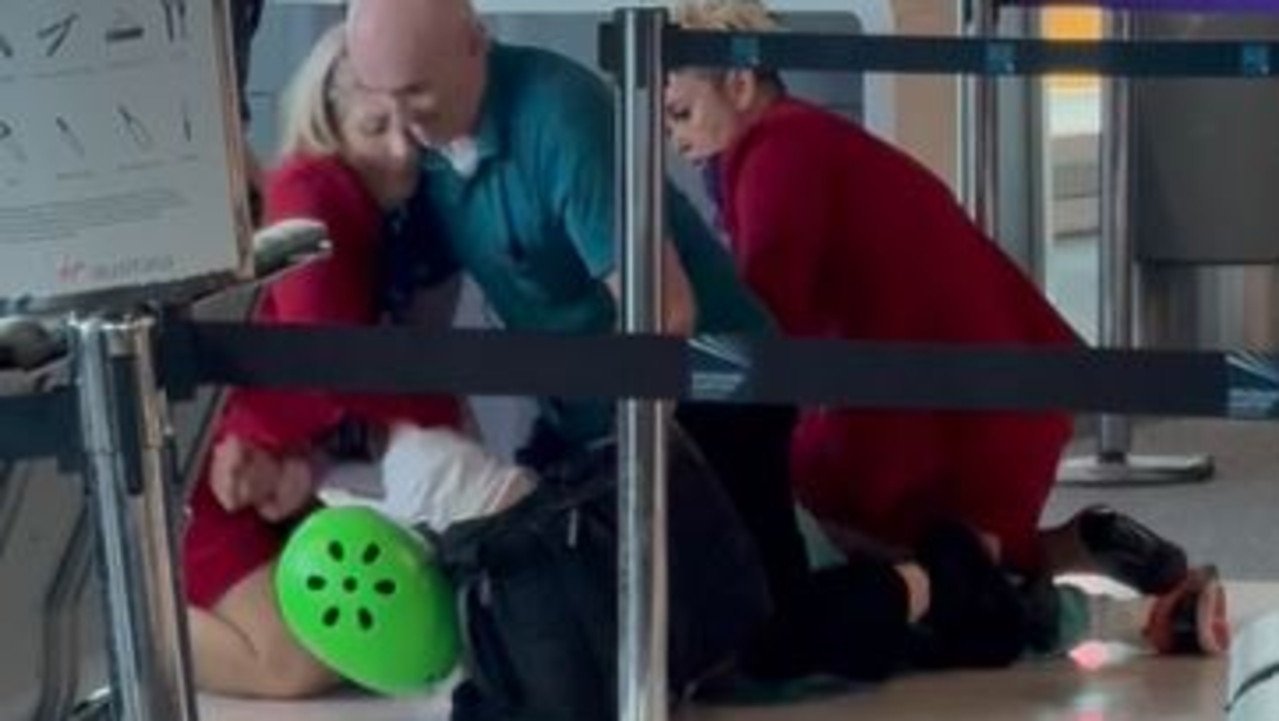 Brisbane Airport ERUPTS as Passenger's Frenzied Attack Leaves Virgin Staffer Bruised - Second Image