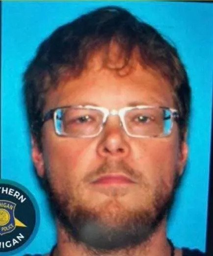 GUNMAN'S RAMPAGE Six Dead in Michigan Bloodbath - Second Image