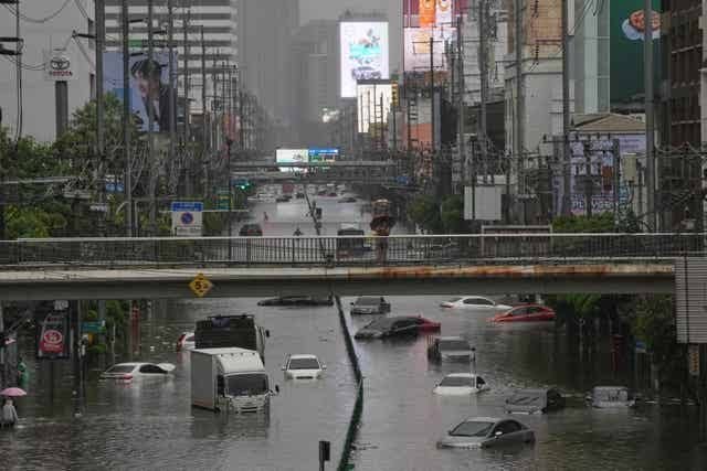 Bangkok Grips Chaos As Floods Engulf City - Second Image